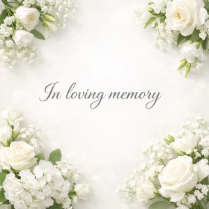 in loving memory sympathy message with white flowers on soft light background