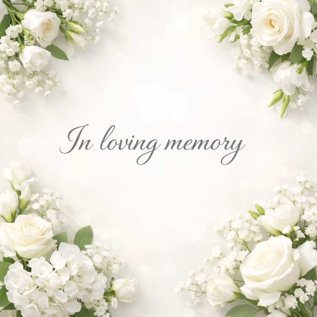 in loving memory sympathy message with white flowers on soft light background