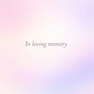 in loving memory sympathy message on soft pastel gradient background