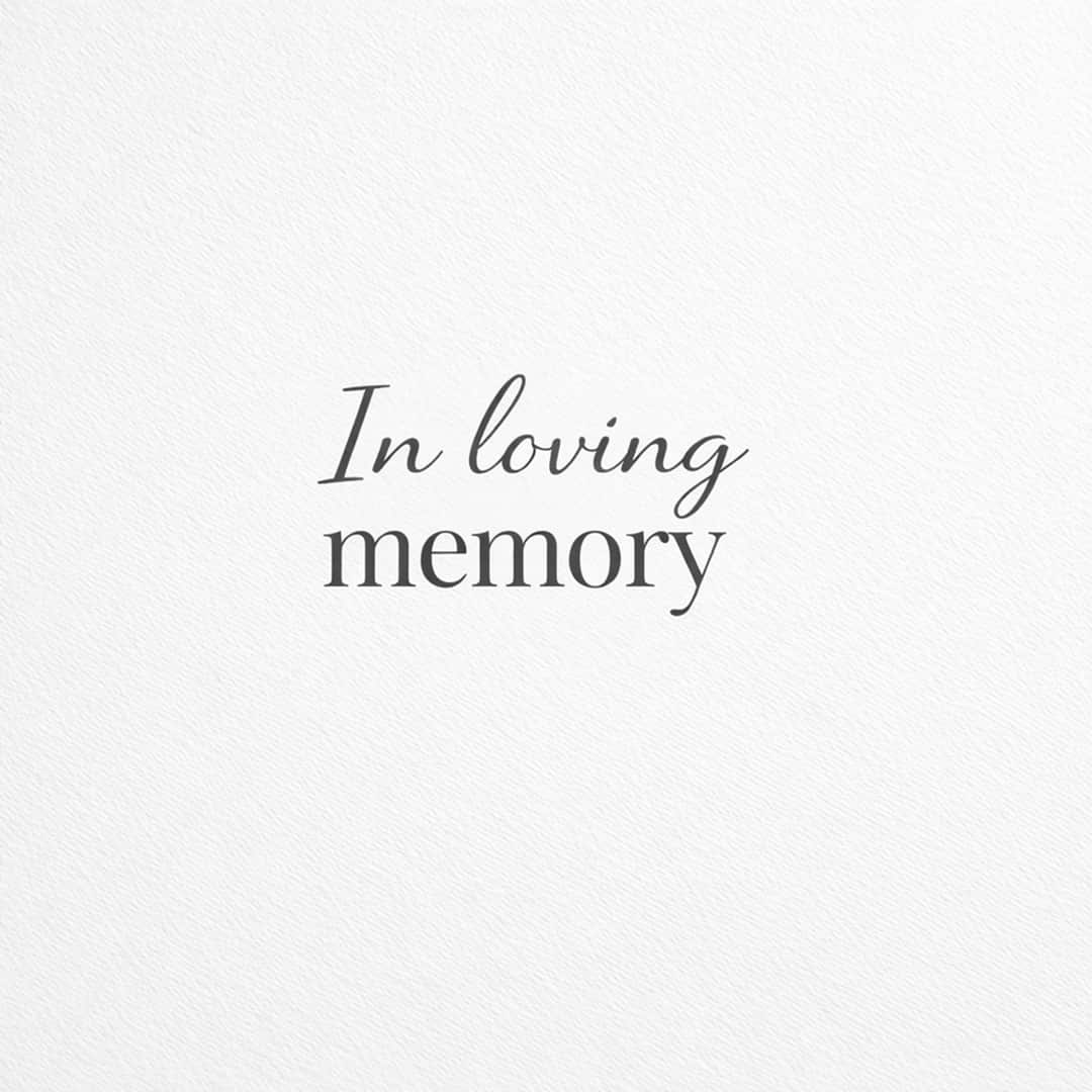 in loving memory sympathy message on clean light minimal background