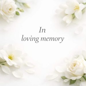 in loving memory sympathy message with soft white flowers on light background
