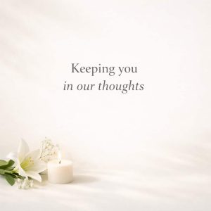 keeping you in our thoughts sympathy message with soft candle and light background