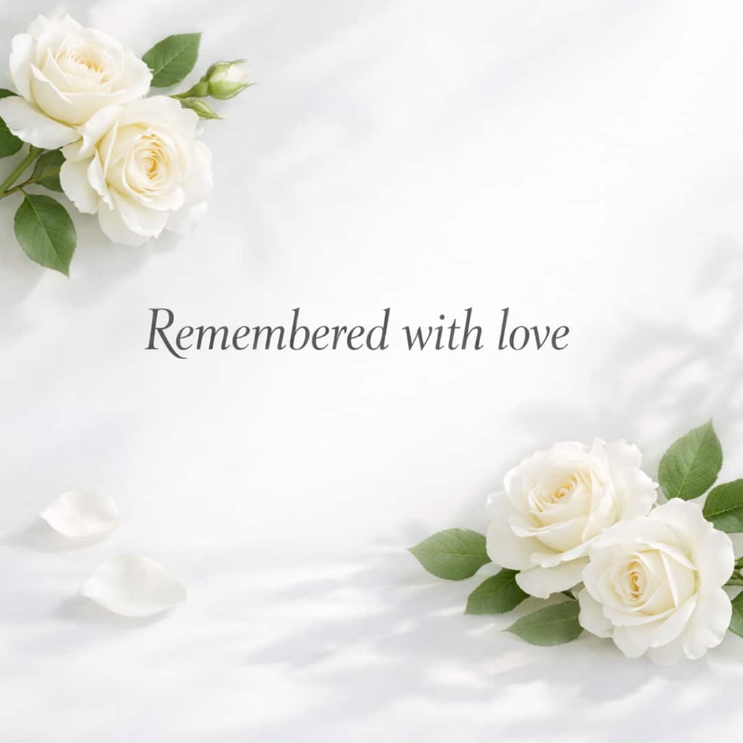 remembered with love sympathy message with white roses on soft background