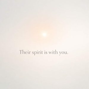 their spirit is with you sympathy message on soft glowing light background