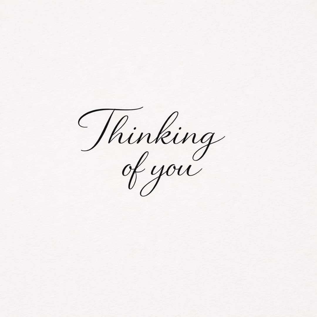 thinking of you sympathy message on clean light minimal background