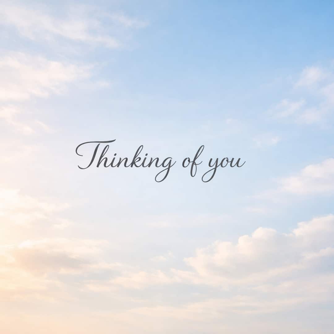 thinking of you sympathy message on soft sky background with clouds