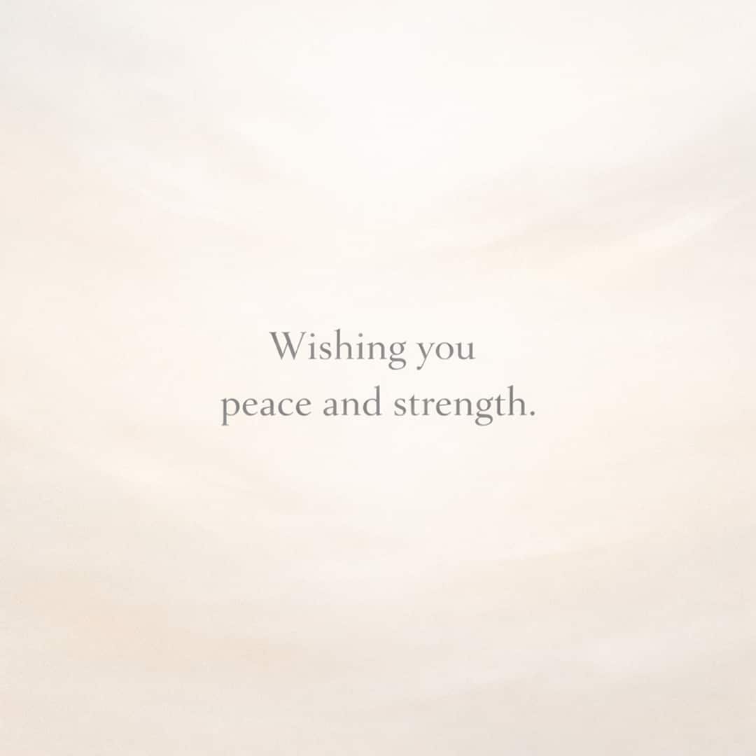 wishing you peace and strength sympathy message on soft beige textured background