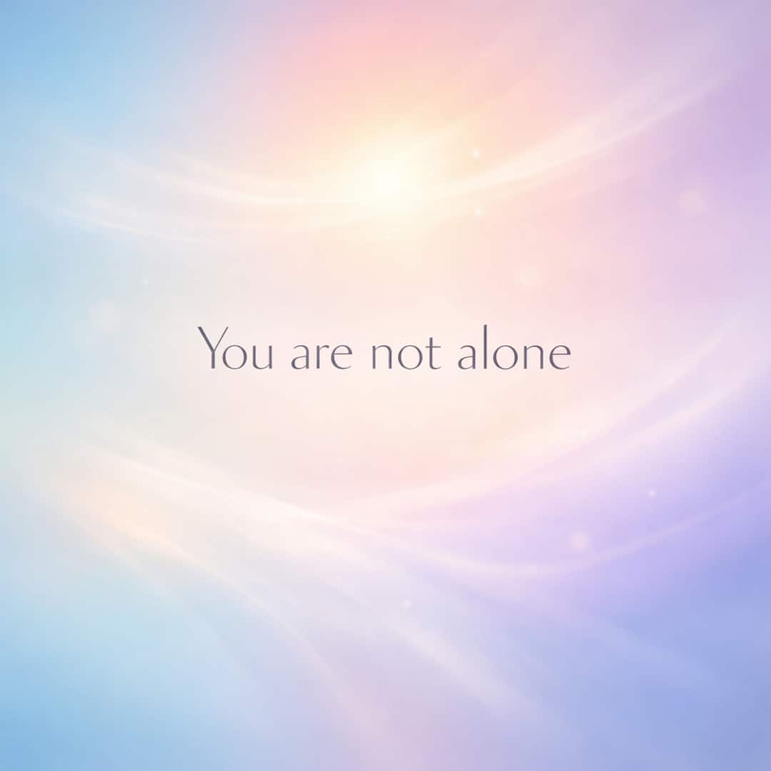 you are not alone sympathy message on soft glowing gradient background
